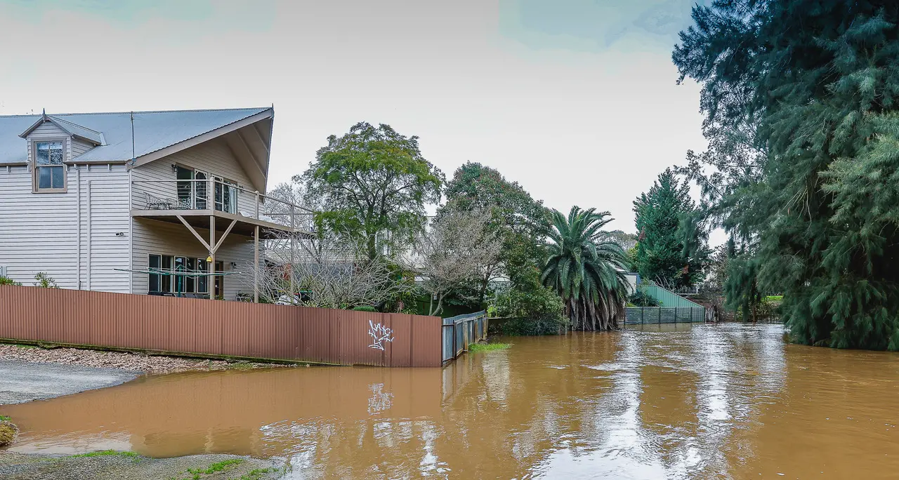 Rivers slowly recede from record drenching